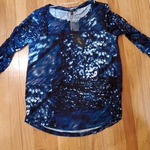 Blue women's shirt, with patterns.